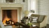 At the far end of the kitchen is a sitting area. The texture of the white bricks installed using dark creates rugged back drop for the soft furnishings.