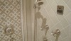 A close up of the above shower shows the steam control unit inside the shower.