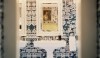 Lonny_3-e1277848800879 This is a highy decorative powder bath with a very bright double sconce over the mirror. Be careful that the light does not blind you as you walk in the space.