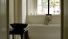 peter-block-e1280150690617 This calm sanctuary is by Peter Block. The Empire tub sits under the window to take advantage of light and shadows. The space reflects a refreshing honesty that feels entirely modern.