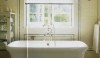 style-and-substance-e1280158072182 The Empire tub looks so inviting with just the right amount of sunlight shining through the window. I love the etagere too - it provides great, accessible storage.