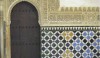 The Alhambra Palace in Morocco was decorated with ornate tile mosaics. Thin white glazed strips between the colored tiles result in complex patterns.