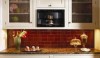 A stunning blood red back splash of dust pressed tile. The color is consistent, the installation rigouous. The choices made were appropriate with the granite counter top.