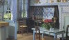 This is Monet's famous blue and white kitchen at Giverney. The walls are decorated with 19th century French tin glazed tiles.