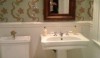 I love the wallpaper in the WC at the Clifton Inn in Charlottesville, Virginia. It's a wonderful complement to the dining room nearby. The vintage wood framed mirror adds just the right touch of antiquity.