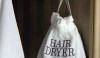 What a great way to store a hair dryer. No question about what is in the bag and no messy cords draped over the door knob.