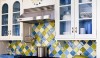Backsplash2 It is not often that we see a combination of bright colored tiles for a backsplash. This is a refreshing focal point and compliments the glazed lava counters.