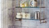 Betty_Lou7 A three tiered shelf is as functional as it is decorative and the nickel finish looks great against the Cararra wall cladding.