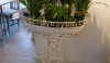 Vintage-Bath-Accessories4 A Victorian iron plant stand adds a level of freshness to the bath either with plants or stacked towels.