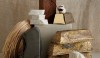Brass ingots in an artistic presentation. This shot features the raw materials such as cotton, clay, and stone as art objects.