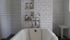 White-Tiled-bath-with-niche_Remodelista-e1299871304443 White on white on white. A never fail classic combination.