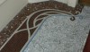 untitled2 It is often difficult to navigate corners with mosaics. This is a Guimard example that is graceful and attractive.