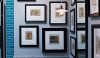 Steven Gambrel has used small scale prints to decorate a bath. Colored tile frames the installation.