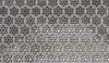 A jali perforated marble screen constructed through the use of Islamic geometric patterns.