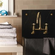 1 This beautiful Easton faucet in brass (with a soapstone utility sink) is configured for wall mounting with wall unions. A dramatic and functional mudroom is the end result.