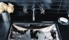 This chrome faucet and sink create a dramatic modern statement with the pewter color ceramic tile and dark counter.