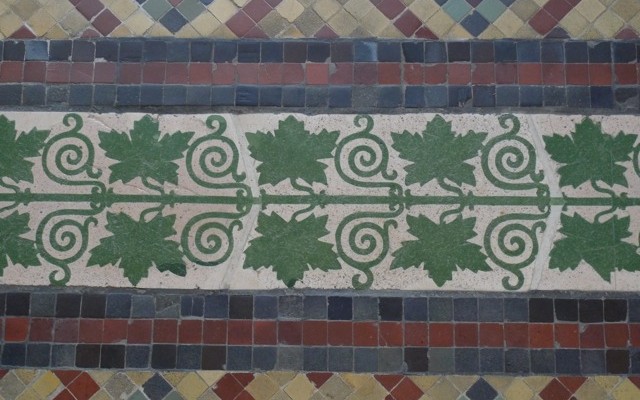 Neues Museum. A complicated organic border in bright greens.
