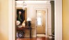 The living room entrance with a view to the porte cochere in the LA house mentioned above.
