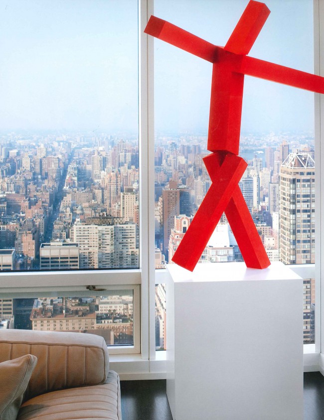 A Joel Shapiro sculpture against the Manhattan skyline.