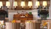 While most of Suzanne's work is quite formal, this house for collectors of American crafts, is casual and comfortable. None more so than the dining room where the table was built from reclaimed floor boards; the penny pitch board hangs above a delightful whirligig by Ed Larsen. This is a a charming space in the American tradition.