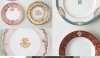 In the 19th century, firms would create patterns with a blank space for a monogram to be inserted later. This is a very formal and elegant treatment of dishes.
