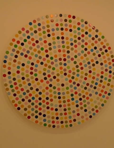 A Damien Hirst painting of "Spots" created on a circle canvas.  Gagosian Gallery, Paris.