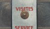 On an iron column at the house entrance were bells to indicate where you should go. We were told each bell had a different sound.