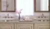 Brooke and  Steve are great at finding vintage cabinets and changing their function. In this case a large cabinet became a  double bathroom vanity with a soft white finish and wall mount fittings. The old mirrors were retro-fitted on the job with recessed storage cabinets and the vintage silver tray holds bath amenities.