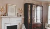 moldings Elegant, simple moldings surround a traditional fireplace. This simplicity allows you to focus not only on the fireplace but on the other objects in the room.