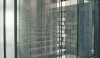 This is the main staircase sheltered by a perforated screen.  One side folds back against the railing, the other slides back.  The light filters through the screens and changes during the course of the day.