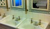 The original voluptuous sinks and separate hot and cold brass taps in the Ladies Room adjacent to the cafe at the V&A are great.  Even the Victorian tile looks appropriate in this space.