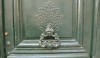 The filagree escutcheon for the door pull is so beautiful. It is just barely visible; painted the same color as the door.