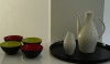 L1030674 As part of a small exhibit of objects that are in museum collections and recognized for their good design are Krenit bowls and Eva Zeisel ceramics.