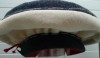 L1030686 A feminine version of a French beret in gray and white with beautiful large white hand stitches and a jaunty red tassel.