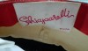 L1030687 Here is the incredible original Schiaparelli label with its distinctive script in bright red.