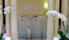 This is my favorite image! Robert took this photo of the elegant installation of urinals at Claridges. Orchids, art and marble in the men's room!