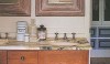 wooden mirrors Open storage, dramatic marble counters, and large scale wood frames on small mirrors create a room of great contrast and interesting materials.