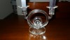 An unusual circular crystal candlestick with an Art Deco feeling.