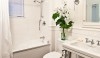 30680841181209167_pHdPGxrF_c There are lovely architectural ceramic details in this bath, but it could have become bland. It was saved by the black penny tile floor with a white border. It grounded the space and added a little drama.