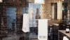 30680841181730717_VUps8oJC_c Sophistication and drama with black marble walls and a modern and graphic mosaic floor.