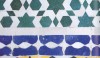 White Zellig Patterns An example of the countless small pieces of tile that make up a pattern. This mixing and matching of colors seems so right in the Moroccan environment.