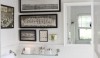 main_room_gallery_emmas-clements-bathroom This pristine white bath is punctuated with a charming assortment of black and white vintage photos. Just enough black in the frames to create a great accent wall.