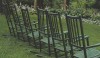 wooden rockers This feels like a Mount Vernon moment. Green rockers overlooking a border garden.