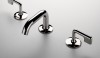 25 Low Profile Three Hole Deck Mounted Lavatory Faucet with Metal Lever Handles The .25 fitting designed by Peter Shelton and Lee Mindel. The graceful quarter radii merge with technical innovation to deliver water in the most modern way possible.