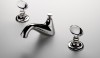 Opus Low Profile Three Hole Deck Mounted Lavatory Faucet with Crystal Egg Handles The elegant and classic simplicity of the Opus fitting creates an easy transition form modern to transitional. The sculptural form and technological innovation appear effortless yet are extremely complex.