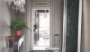 3 An elegant entrance gallery in a pied-a-terre. It shimmers with silver and crystal.