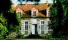 It is clear that this house could be 'love at first sight'. A lovely stone exterior, just the right size, mature trees and gardens and the warmth of a French country house.As seen in Veranda Magazine, photograph by Alexandre Bailhache.