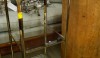 I can imagine this brass and glass small table next to a pedestal sink in a small bath or powder room. It is a perfect size and three shelves are great for a small collection of objects and some extra towels.