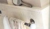 Cream tile Exceptional creamy white ceramic tile with a fine crackle is my personal choice for nearly every tile surface in my own house. Additionally, the molding is crisp and the one piece corner is a very polished detail.