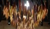A crazy chandelier made of cloth carrots, parsnips , beets and other root vegetables. A prize here for thinking out of the box.